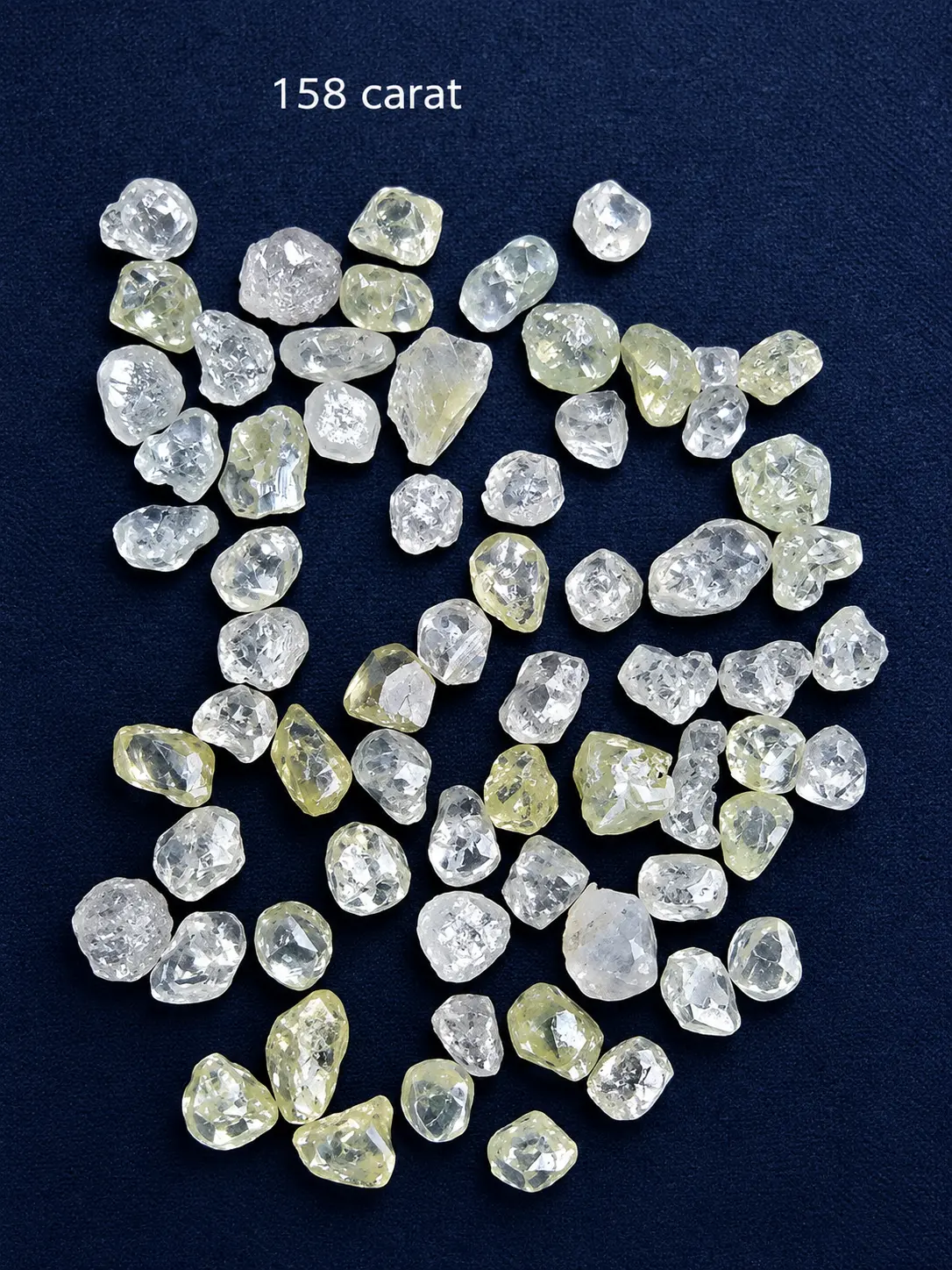 A 158 carat lot of clear and pale yellow mineral samples